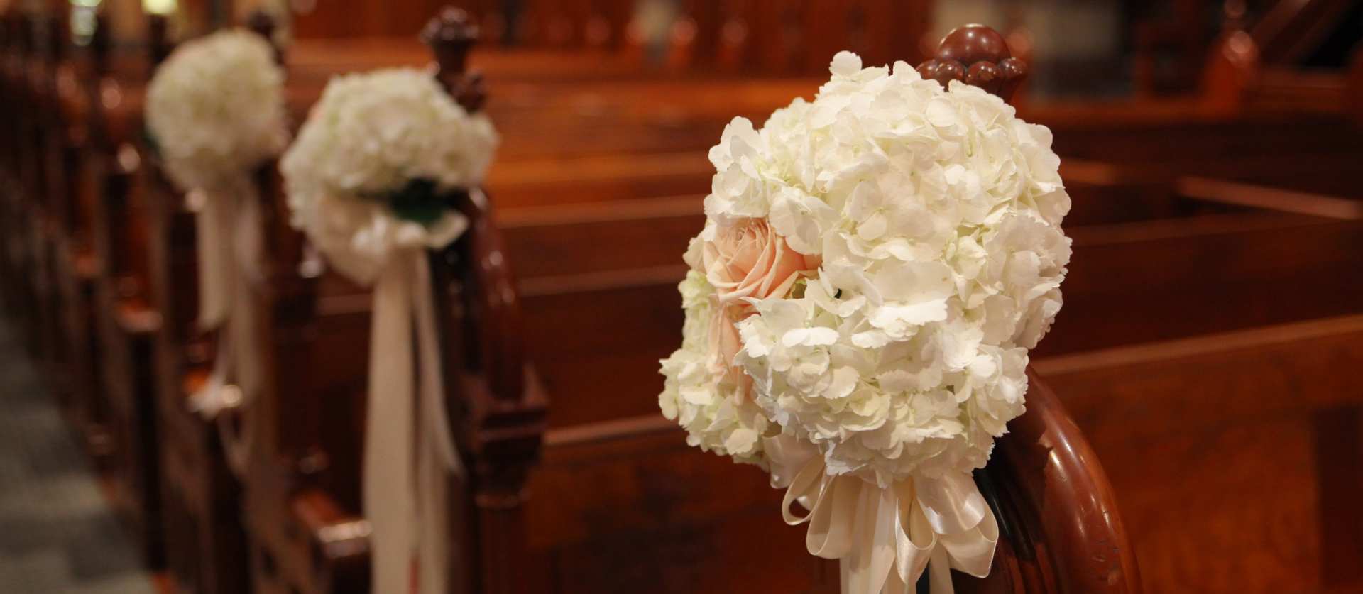 Pews decorated with flowers